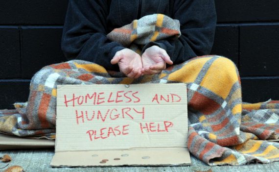 man-with-homeless-and-hungry-sign